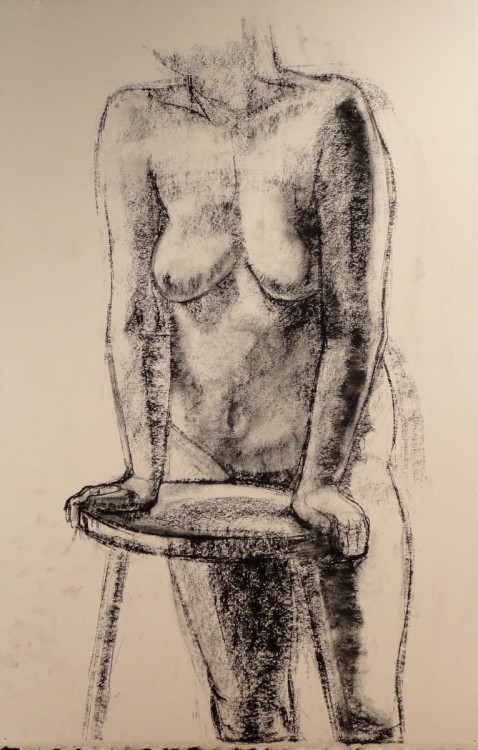standing figure with stool